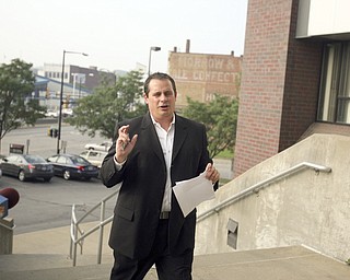 ROBERT K. YOSAY | THE VINDICATOR...ROBERT K. YOSAY | THE VINDICATOR ..Martin Yavorcik, walks up the stairs to the Mahoning County Justice Center to be booked after being indicted by a grand Jury - he was joined by Flora Cafaro Michael Sciortino,.John McNally IV and ,Flora Cafaro, ..-30-...-30-