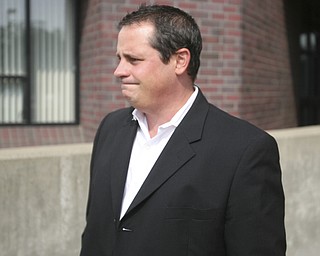 ROBERT K. YOSAY | THE VINDICATOR...ROBERT K. YOSAY | THE VINDICATOR ..Martin Yavorcik, walks up the stairs to the Mahoning County Justice Center to be booked after being indicted by a grand Jury - he was joined by Flora Cafaro Michael Sciortino,.John McNally IV and ,Flora Cafaro, ..-30-...-30-