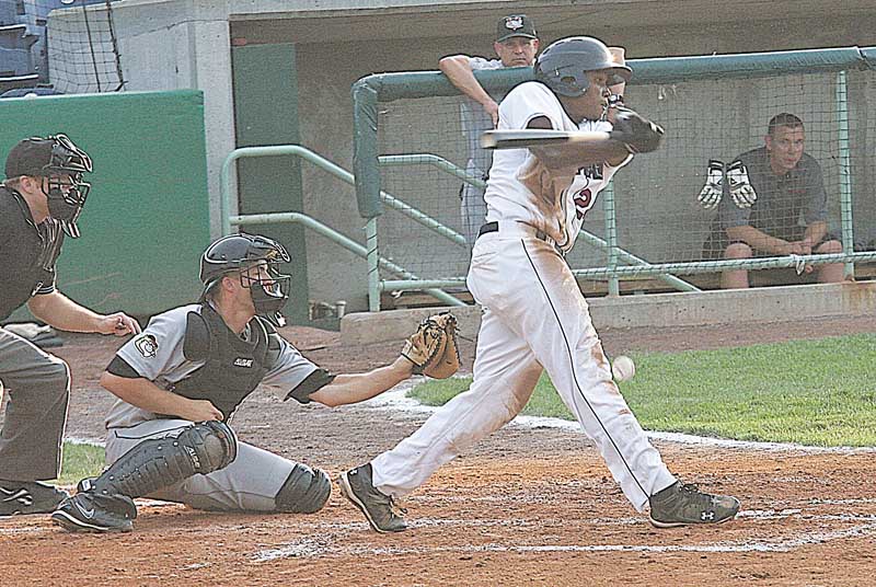 Carlos Moncrief fouls the ball off his leg during Wednesday’s game at Eastwood Field against the Tri-City ValleyCats. The catcher is Buck Afenir of Tri-City and the umpire is Aaron Reynolds.