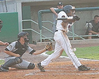 Carlos Moncrief fouls the ball off his leg during Wednesday’s game at Eastwood Field against the Tri-City ValleyCats. The catcher is Buck Afenir of Tri-City and the umpire is Aaron Reynolds.