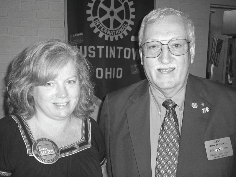 Making the rounds: At its Aug. 9 meeting the Rotary Club of Austintown welcomed, at right, District 6650 Governor Jim Russell of Newcomerstown, who is attempting to fulfill his obligation to visit the 48 clubs in the district during his tenure. He has 19 more clubs to visit. Russell told how he became involved in Rotary and presented a video, “Engaging With Rotary,” that showed how each member moves within the 33,000 clubs worldwide. He asked members to work on meaningful projects, to build memberships, to support the Rotary Foundation and to support the worldwide distribution of lit kits. When she joined Russell after his talk, Susan Leetch, club president, presented the speaker with a gift and a book to be donated in his name to Woodside Library.