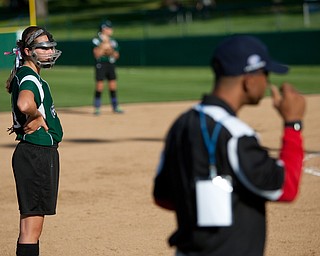 Arilia Duarte eyeballs the coach from Puerto Rico trying to decipher his signals to the batter during the 2010 World Series of Little League Softball, Central vs. Latin America. Central went on to win the game, 7-4.