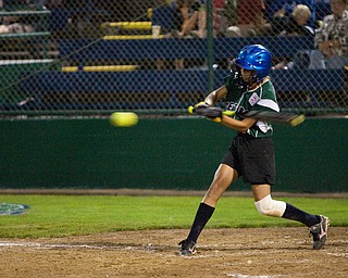 Abby Masluk swings at a fastball during the World Series of Little League Softball in Portland, Ore., July 13th, 2010. The team from Poland, OH went on to beat the team from Brenham, TX, 5-4.