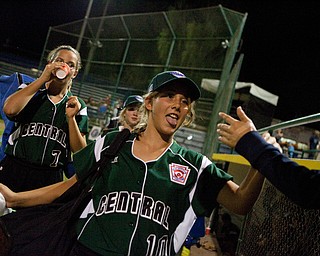 Cara Kalouris gets a congratulatory high-five after her team wins their first game at the World Series of Little League Softball in Portland, Ore., July 13th, 2010. The team from Poland, OH beat the team from Brenham, TX, 5-4.