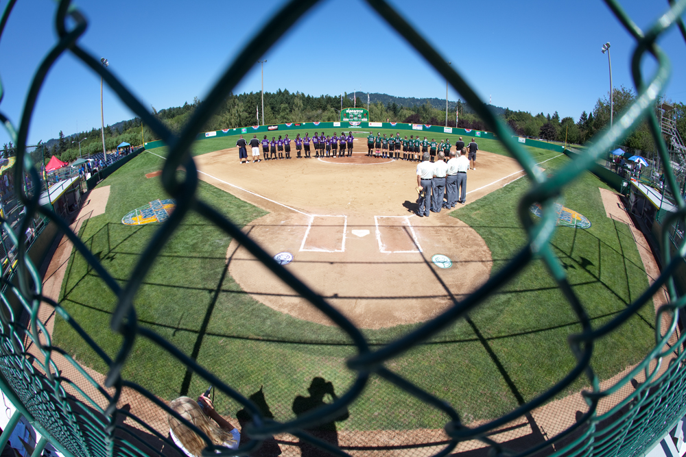 Teams line up for the National Anthem before the 2010 World Series of Little League Softball in Portland, Ore., August 15th, 2010. This game the team from Poland, Ohio face the team from Burbank Calif., Central was defeated by West, 0-1.