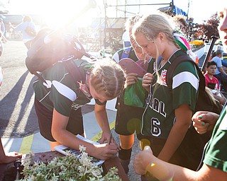 Special to the Vindicator: Chris Ryan
The girls from Central sign autographs for fans at the 2010 World Series of Little League Softball in Portland, Ore., August 16th, 2010. The team from Poland, Ohio beat the team from Canada, 7-1, and will advance to Semi-Final play.