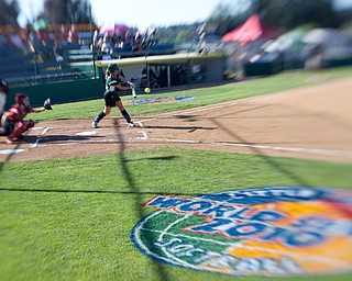 Special to the Vindicator: Chris Ryan
Ally Deemer gets a solid piece of the ball during the 2010 World Series of Little League Softball in Portland, Ore., August 16th, 2010. The team from Poland, Ohio beat the team from Canada, 7-1, and will advance to Semi-Final play.