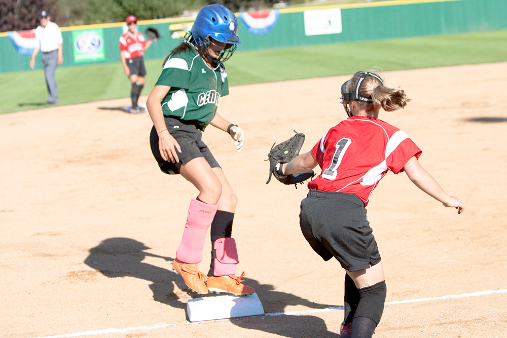 Special to the Vindicator: Chris Ryan
Dani Rutana hustles safely back to the bag during the 2010 World Series of Little League Softball in Portland, Ore., August 16th, 2010. The team from Poland, Ohio beat the team from Canada, 7-1, and will advance to Semi-Final play.
