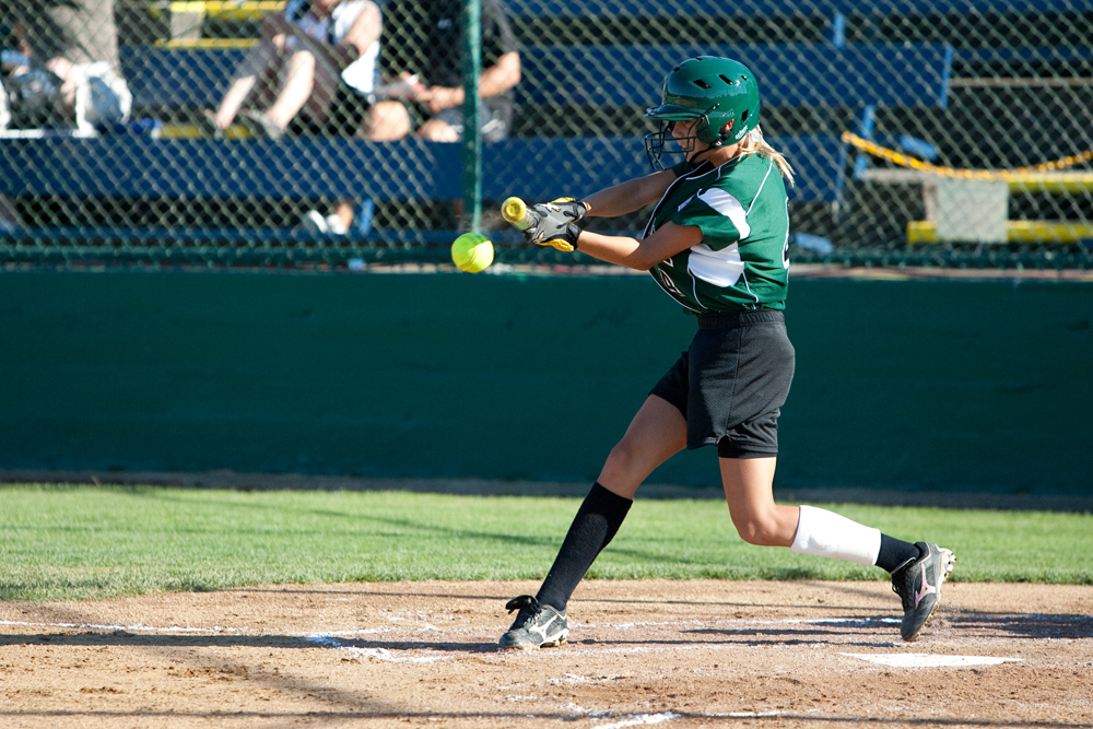 Special to the Vindicator: Chris Ryan
Abby Masluk with a solid ground hit to the infield during the 2010 World Series of Little League Softball in Portland, Ore., August 16th, 2010. The team from Poland, Ohio beat the team from Canada, 7-1, and will advance to Semi-Final play.