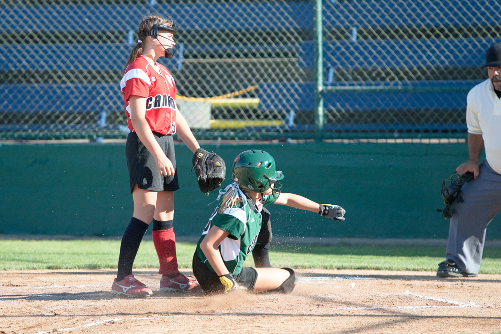Special to the Vindicator: Chris Ryan
Claire Testa slides safely into home during the 2010 World Series of Little League Softball in Portland, Ore., August 16th, 2010. The team from Poland, Ohio beat the team from Canada, 7-1, and will advance to Semi-Final play.