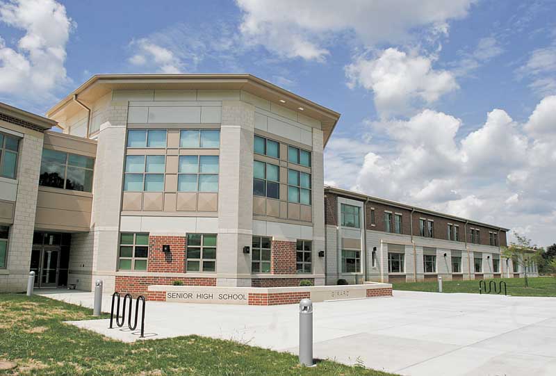 A distinctive architectural shape highlights the front of the new junior/senior high school, 1244 Shannon Road.