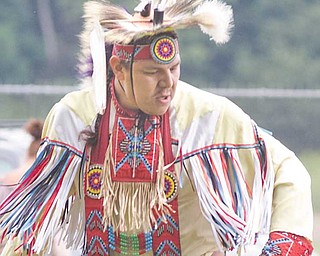 Blaine Tallchief of Salamanca, N.Y., performing at the Red Hawk Native American Pow Wow at Trumbull County Fairgrounds on Sunday.