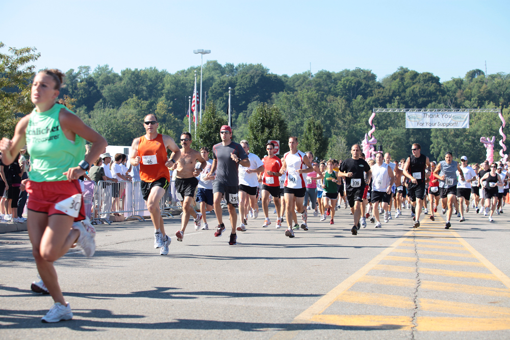 LESLIE CUSANO | THE VINDICATOR.Participants in the Panerathon 10K & 2 mile fun walk/run take off from the starting line Sunday. All money raised from the event will help build the Joanie Abdu Comprehensive Breast Care Center.