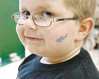 LISA-ANN ISHIHARA | THE VINDICATOR...Pre-schooler David Vukanrich shows off his face painting at Holy Family Elementary School's 50th birthday party on Friday, September 12, 2008...