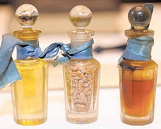 Small bottles of oil and corn were among the items stored 100 years in the lodge’s cornerstone.