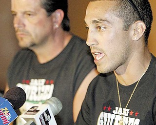 William D Lewis The vindicator Jake the Bull Giuriceo, right, and trainer Keith Burnside during a 9-1 news conference at Los Gallos in Boardman.