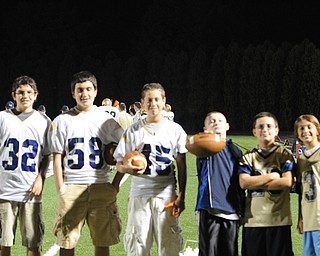 Some of the Lowellville water and ball boys take a moment for a picture during the Lowellville/ YCS game. - KELLY TKACH