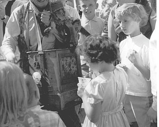 Chuck Cavanaugh of New Middletown submitted this Canfield Fair memory of an organ grinder and his monkey touring the fair, which he took in 1968.