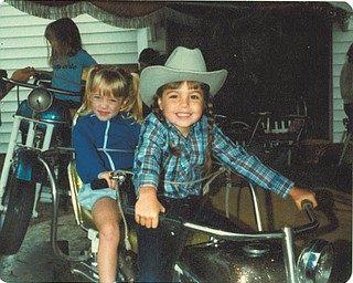 This picture of Toni (Shields) Acevedo of Boardman and Stephanie Gibson of Columbus enjoying the kiddie ride was taken in 1981.