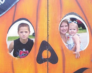 Michael, left, Sierra and Chelsea Campbell of Youngstown attended the 2009 Canfield Fair.