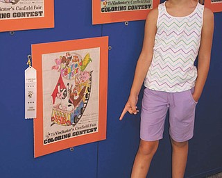 Hailey Kadivar of Bradenton, Fla., granddaughter of Bob and Joan Stroh of Poland, points out her 3rd-place finish in the coloring contest of 2009.