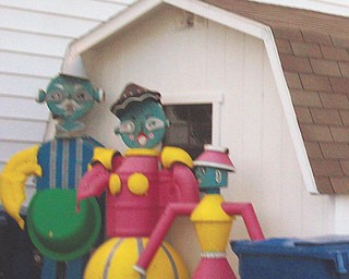 Another of Annette McCarthy's memories of the fair, a tin-man family.