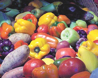 An assortment of veggies make a colorful display at the Canfield Fair. Photo by Annette McCarthy.