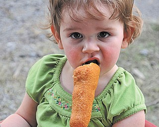 Brienna Kollar of Hudson, Ohio, enjoys her very first corndog ever at the 2009 Canfield Fair. She was 1 1/2 years old when her grandmother, Elaine Kollar of Lowellville, snapped this photo.