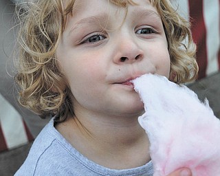 In this photo sent in by Elaine Kollar of Lowellville, Natalie Kollar, her granddaughter who lives in Hudson, Ohio, enjoys some cotton candy.