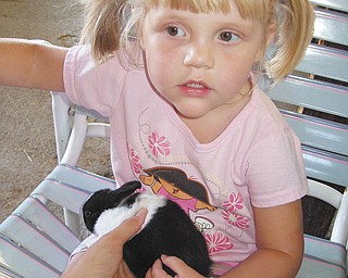 Lindsey holds a bunny at the fair. Photo submitted by Danielle Springer of Detroit, Mich.