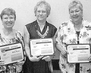 Niles chapter sews up award: Jennie Roberts, center, accepted an award in August on behalf of the Niles Chapter of the American Sewing Guild at the national guild conference. The Niles chapter was named national “Chapter of the Year” for medium-size guilds. The award was given for outstanding performance by a chapter between 75 and 174 members in the areas of membership growth and development, service to members, outreach to retailers and community, publicity and information communication, and governance. Along with the national recognition, the Niles guild was awarded $1,000. Membership in the guild is open to all those interested in sewing.