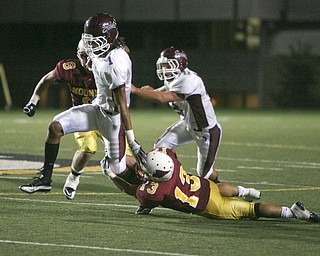 Dayne Hammond (#1) is seen here during Cardinal Mooney's win over Boardman in the 2010 season. Hammond had planned on playing for Warren G. Harding this year.