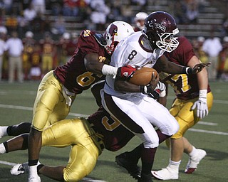 ROBERT K. YOSAY | THE VINDICATOR..CAUGHT FROM BEHIND - Boardmans QB #8 Trae Robinson is brought down by #6 Jarvis Abrams behind the line for a loss - Boardman @ Mooney (YSU).-30
