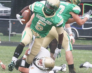 URSULINE - (5) Jesse Curry tries to get away from (5) Austin Vasko Saturday afternoon. - Special to The Vindicator/Nick Mays