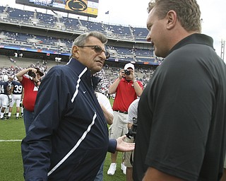 ROBERT K. YOSAY | THE VINDICATOR..YSU Eric Wolford and PSU Coach Joe Paterno share a moment before the big game.YSU LOSES 44-14 PENN STATE at BEAVER STADIUM IN HAPPY VALLEY.-30