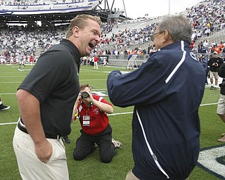 ROBERT K. YOSAY | THE VINDICATOR..YSU Eric Wolford and PSU Coach Joe Paterno share a moment before the big game.YSU LOSES 44-14 PENN STATE at BEAVER STADIUM IN HAPPY VALLEY.-30