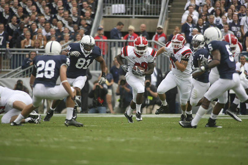 ROBERT K. YOSAY | THE VINDICATOR..***** 80  Yard romp for YSU first touchdown  is  YSU #29  Dominique Barnes  as he breaks the hole - #72 YSU  Andrew Radakovich is behind him and he leaves in the dust  PSU #28 Drew  Astorino #81   Jack Crawford #71  Devon Still and #   Graham Zug - this was YSU first TD .YSU  LOSES 44-14   PENN STATE at BEAVER STADIUM IN HAPPY VALLEY.-30