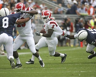 ROBERT K. YOSAY | THE VINDICATOR..Second quarter action as YSU #5 Randy Louis gets caught by PSU #15 Bany Gbadyu making the block is #29 YSU Dominique Barnes on #8 PSU D'Anton Lynn- he made the first down..YSU LOSES 44-14 PENN STATE at BEAVER STADIUM IN HAPPY VALLEY.-30