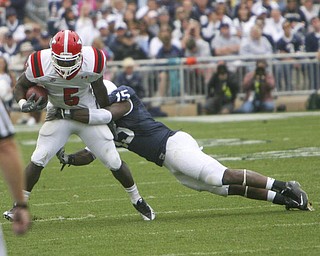 ROBERT K. YOSAY | THE VINDICATOR.. Breaking a tackles is YSU #5 Adaris Bellamy as he breaks #15 PSU Bani Gbadyu during second half action .YSU LOSES 44-14 PENN STATE at BEAVER STADIUM IN HAPPY VALLEY.-30