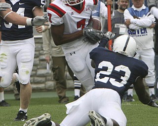 ROBERT K. YOSAY | THE VINDICATOR..YSU #7 Ely Ducatel Dives for the end zone for YSU Second TD as PSU #23 S. Obeng-Agyapong (ok) Misses te tackle.YSU LOSES 44-14 PENN STATE at BEAVER STADIUM IN HAPPY VALLEY.-30