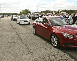 ROBERT K. YOSAY | THE VINDICATOR..Flanked by the Boardmah Band - Cruze's Cruze by GM Lordstown Kicked Off the Chevy Cruze today at the Lordstown Plant with the President of GM - Tim Ryan - The Boardman Band and a slew of elected officials -..-30-..