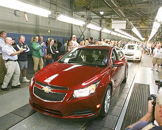 ROBERT K. YOSAY | THE VINDICATOR..CRIZE's come off the land as GM Lordstown Kicked Off the Chevy Cruze today at the Lordstown Plant with the President of GM - Tim Ryan - The Boardman Band and a slew of elected officials -..-30-..