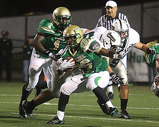 URSULINE - Akise Teague makes a move Friday night at YSU. - Special to The Vindicator/Nick Mays