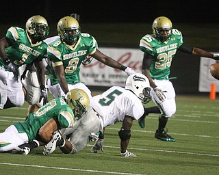 URSULINE - Jordan Markota causes (5) Richie Sanders to fumble as (8) Keil'n Thurston comes up with the ball Friday night at YSU. (! Trevor Smith and 25 Tramain Thigpen) Special to The Vindicator/Nick Mays