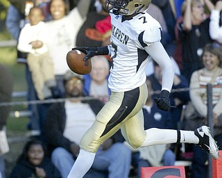 William D Lewis|The Vindicator Harding's Edward Killingworth scores during 1 rst qtr action Friday at Howland.