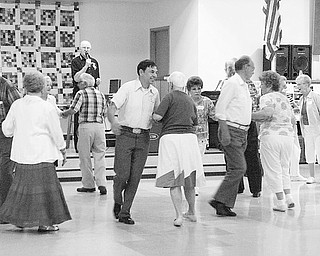 Niles SCOPE Senior Center of Trumbull County has resumed square dancing classes Tuesdays at the center, 14 E. State St., Niles. Learning the basic steps is easy. With Norm Flavell serving as caller and teaching the moves, this group of seniors gets into the swing of things during a recent class. The cost is $3 for each dance session. Interested senior citizens can sign up for the classes by calling 330-544-3676, or can just stop at the center on any Tuesday and join the group as it do-si-dos, circles four or promenades around the floor.