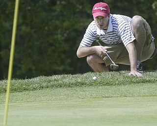 William D. Lewis| The Vindicator Michael McClure lines up a shot at Greatest Golf Tourney Saturday.