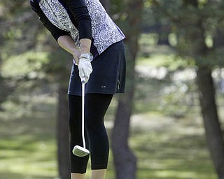 William D. Lewis| The Vindicator Alexandra Casi makes a putt at Greatest Golf Tourney Saturday.