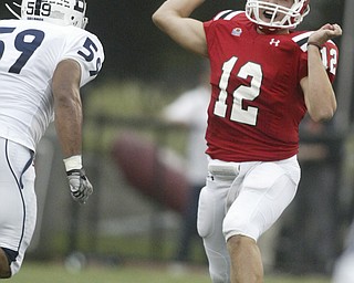 William d LEwis The Vindicator YSU QB Kurt Hess fires overs Butlers Jordan Ridley during 1 st half action.