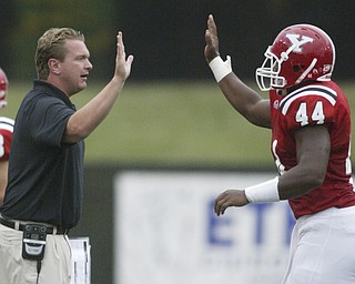 William D LEwis The Vindicator Eric Wolford gives hi 5 to AndrewJohnson during 1 rst half Sat against Butler.
